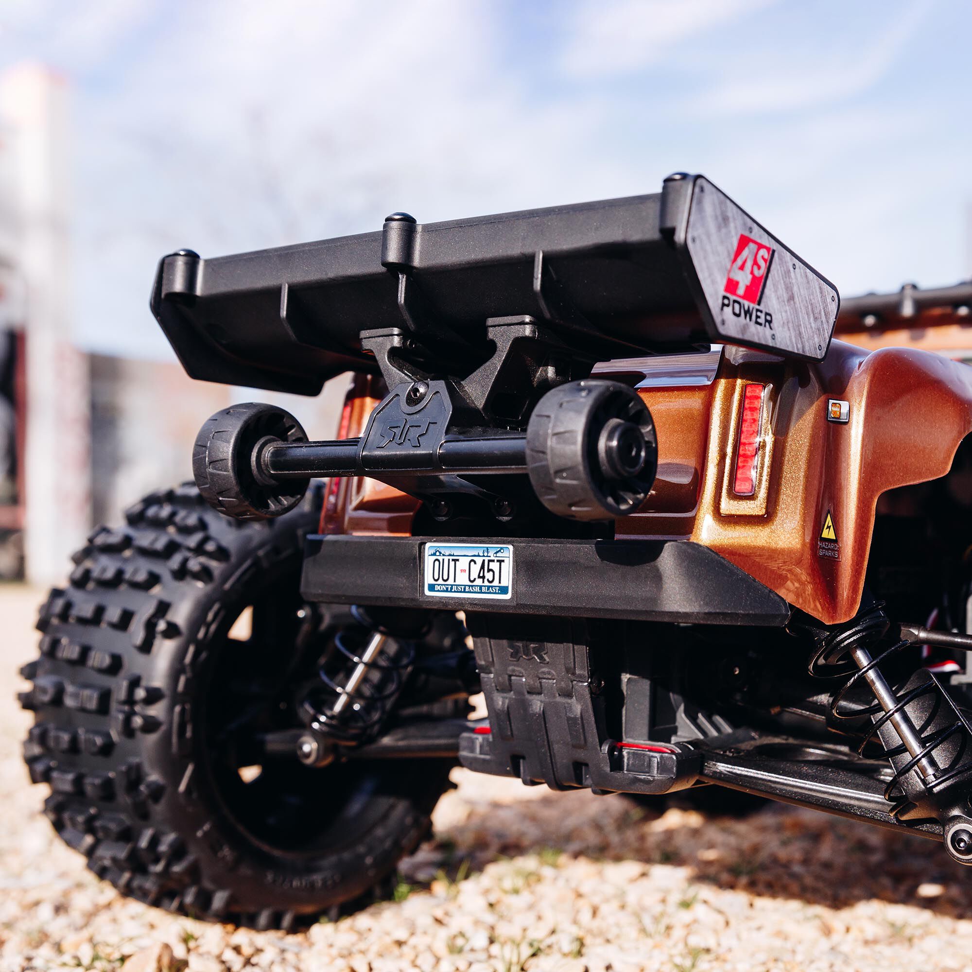 1/10 OUTCAST 4S 4X4 RTR Brushless Stunt Truck, Bronze | ARRMA